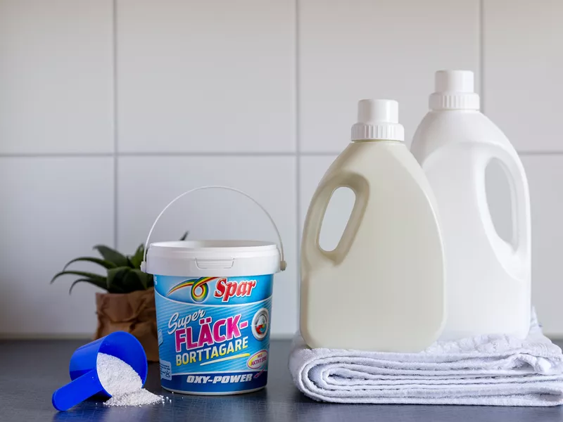 Plastkrukke til vaskemiddel med tryk. Fungerer også til flydende vaskemiddel
